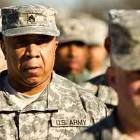 During Marine Week of the Career Orientation and Training of Midshipmen  (CORTRAMID) West 2001 at Marine Corps Base (MCB) Camp Pendleton,  California, midshipman Melanie Ahle looks at the next obstacle course  challenge -