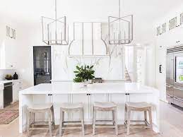 A large teak accessory like this giant wood bowl makes for a seamless addition on the countertop or kitchen table. 15 Accessories That Pair Perfectly With An All White Kitchen Home White Kitchen Accessories White Kitchen Island