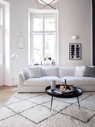 Although the scandinavian design has been around since the 1950s, it still remains a popular trend in interior design today. 12 Scandinavian Rugs For The Perfect Nordic Look Living Room Scandinavian Minimalist Living Room Scandinavian Design Living Room