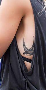 30 Feminine Rib Tattoo Ideas For Women That Are Very Inspirational Bird Tattoo Ribs Rib Tattoo Bird Tattoos For Women