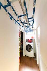 遊び心を忘れない毎日を快適に楽しく暮らす家事動線を考え尽くした家 家 ランドリールーム 小さなランドリールーム