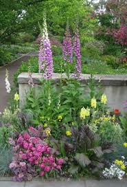 This Is From The Chanticleer Garden I Love The Use Of Edibles And Foxgloves This Fits The Color Theme Of This Bed M Beautiful Gardens Plants Cottage Garden