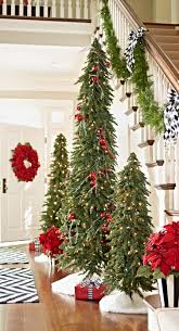 Christmas tree, live or artificial evergreen tree decorated with lights and ornaments as a part of christmas festivities. Down Swept Slim Pine Christmas Trees Grandin Road Skinny Christmas Tree Rustic Christmas Tree Christmas Deco