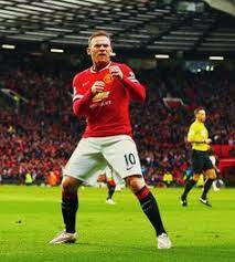The former manchester united striker has apparently fallen asleep standing up with his chin to his chest and his. Wayne Rooney