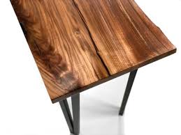 We made sure to match the hardware on the underside of the desk to the legs. Live Edge Desk Wescover