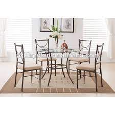 This flatware set provides a sophisticated accent to a neutral table setting. 5 Piece Copper Metal Glass Round Kitchen Dinette Dining Table Set Buy Dining Table Set Kitchen Dinette Metal Glass Round Dining Table Product On Alibaba Com