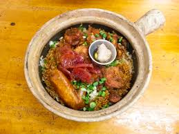 When the rice starts to boil (about 6 minutes), add in the chicken, shredded radish, salted fish and chinese sausages on top of the rice. Heun Kee Claypot Chicken Rice Pudu A Favorite Thefoodbunny
