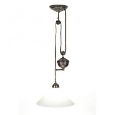 A classic rise and fall light fitting in an antique brass finish. Traditional Rise And Fall Ceiling Light In Aged Brass