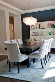 The chandelier's clean design is ideal for any dining room, kitchen, bedroom, and living room in contemporary, traditional, or transitional style settings. Blue Transitional Dining Room With Eye Catching Chandelier Hgtv