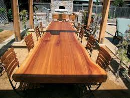 An Outdoor Table Made Of A Slab From A Naturally Fallen Redwood Tree Reclaimed Wood Table Timber Furniture Outdoor Dining