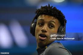 Head coach Alan Knipe of the Long Beach State 49ers speaks with Kyle...  News Photo