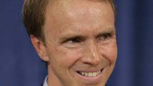 Hollenbach wins in crowded district court field.