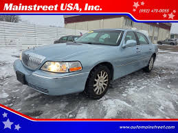 Image result for Light Ice Blue 2008 Town Car