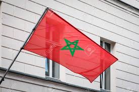 ⴰⵛⵏⵢⴰⵍ ⵏ ⴰⵎⵔⵔⵓⴽ ) is a while morocco was under french and spanish control, the red flag with the seal in the center remained in. Moroccan Flag On Pole On Building Morocco Flag Stock Photo Picture And Royalty Free Image Image 125099488