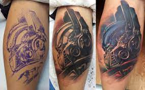 Bumblebee transformer tattoo on side thigh. Transformers Tattoos