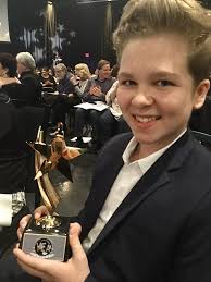 VT's Jaxon Mercey looking good with that The Young Entertainer Awards  trophy for best voice actor as Prince Wednesday