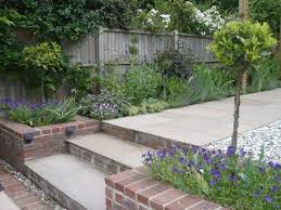 Sloping Long And Thin Garden Shoot Sloped Garden Patio Landscaping Patio Garden