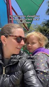 Mom Doing Hand Gestures at Game