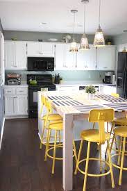 At target, find a wide range of kitchen carts and islands. View In Gallery Bright Yellow Bar Stools In A Kitchen With Small Touches Of Green Stools For Kitchen Island Kitchen Stools Green Bar Stools