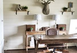 Natural wooden furniture, checked patterns, real tree branches on the floor and lots of cute fabric. 10 Rustic Home Office Decorating Ideas For A Cozy Vibe