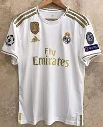 Another stylish element, new this year, is the modern round collar, also with simple golden details. New Real Madrid Home Jersey With Champions Patches Lower T Shirt Soccer Shirts Real Madrid