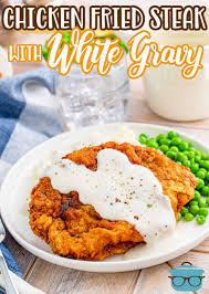 By garrison wayne as a child, i believe that chicken fried steak was my favorite country style dinner.maybe because. Chicken Fried Steak With White Gravy The Country Cook