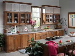 Tougher and stronger than maple or oak, hickory adds flavor to your decor and home just as it does to a barbecued meal dark flooring creates a solid base for hickory cabinets. Kitchen Cabinet Woods And Finishes Bertch Manufacturing