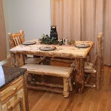 Whether you're looking for rustic rustic log furniture for your living room, a rustic log bed set for your cabin master suite, a rustic table for your cabin dining room, or a custom log bathroom vanity for your retreat bathroom, we can help with natural wood products made from aspen, pine, walnut, hickory, cedar and even antler, wrought iron. Rugged Materials Make Lodge Decor Unique Log Furniture Living Rustic Wood Furniture Cabin Furniture Log Furniture