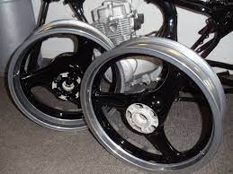 After waiting 30 minutes, unwrap the part and scrape off as much powder coat as you can. Powder Coated Motorcycle Wheels Ctc Powder Coating