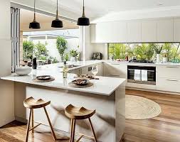 Providing a neutral backdrop, white kitchen cabinets can be left alone or dressed up with colorful art and accessories. 10 Design Tips For Your Kitchen With Antique White Kitchen Cabinets