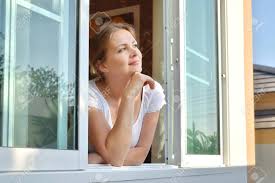 2021, сша, триллеры, драмы, детективы. Beautiful Girl Looking Out The Window The Woman In The Window Stock Photo Picture And Royalty Free Image Image 136855261