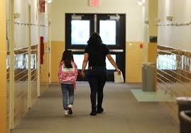 PHOTOS: Smiles, hugs greet students at Lincoln Elementary as Casper schools  open