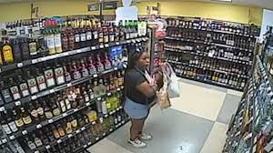 Surveillance video shows Ta'Kiya shoplifting bottles of alcohol before  being fatally shot by police | 10tv.com