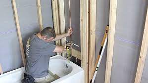 Removed tub/shower combo, installed schluter waterproof curbless shower system with ramp, tile and handicap grab bars in apartment at the reserve at mayfair. Tub Shower Combo Remodeling Quick Tips Home Repair Tutor