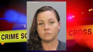 NEW: Woman accused of killing Delray officer stuck in Miami-Dade jail