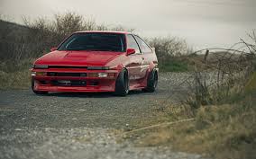 Explore toyota ae86 wallpapers on wallpapersafari find more items about toyota ae86 wallpapers ae86 drift toyota corolla sprinter. Hd Wallpaper Red Sports Car Toyota Ae86 Corolla Transportation Mode Of Transportation Wallpaper Flare