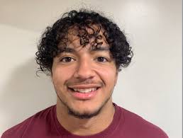 Altoona defensive end Manny Miller makes his college pick