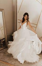 There are lots of cheap wedding dresses online for those who want to skip the bridal shop.you can find beautiful wedding dresses under $500 or even whether you want a traditional gown, a simpler dress, or something in between, here are 22 sites to check out for wedding dresses under $500. Andi Von Hayley Paige Erhaltlich Bei Minneapolis Seattle A Be Bridal Shops S Wedding Dresses Whimsical Stylish Wedding Dresses Wedding Dress Shopping