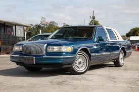 Image result for Dark Cordovan 1998 Town Car