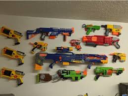 This is sure to be every kid's favorite spot in the house! Mounted Display Hooks Tools Nerf Guns By Pixel2plastic Thingiverse