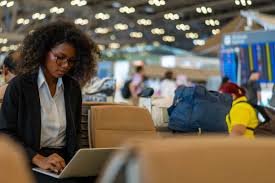 410+ Business Woman Working On Laptop In International Airport Stock  Photos, Pictures & Royalty-Free Images - iStock
