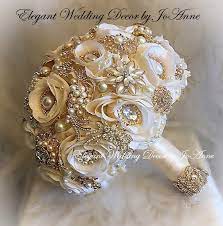 Golden flower tone is a special selection of gold flowers that has been carefully transitioned into rich golden and bronze tones. Custom Brooch Bouquet Ivory And Gold Wedding Bouquet Gold Jeweled Bridal Bouquet Bouquet Wedding Flowers Brides Bouquet