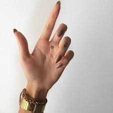 In This Board You Ll Find The Most Inspiring And Meaningful Mini Tattoos For Girls We Share The Best Ide Tiny Finger Tattoos Small Finger Tattoos Palm Tattoos