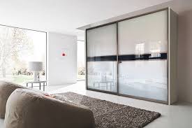 Beautiful bedroom cabinet design ideas for small spaces door knobs. Glass White Wardrobe Design Magnon India Best Interior Designer In Bangalore Top Interior Designers