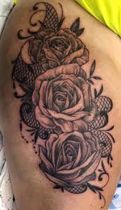 Rose tattoos are so incredibly stunning. Gabriela S Thigh Design Of Roses And Crow Cross Tattoos Facebook
