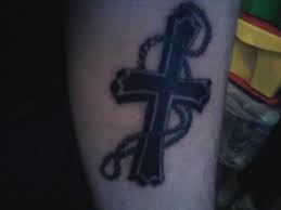 For devout catholics, a rosary cross tattoo is a strong candidate for your next tattoo. Black Cross Rosary Tattoo