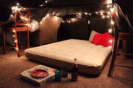 A Chill Stay At Home Date For Couples Build A Little Fort With Christmas Lights White Or Colored A Blow Up Mat At Home Date Dream Dates At Home Date Nights