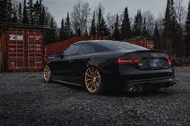 This Supercharged Audi S5 Was Built By Martin Barkey S Crew At The Garage And Is Equipped With Accuair Suspension Mbrp Performanc Audi S5 Audi Cars Audi Coupe