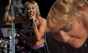 Watch miley cyrus headline super bowl lv tailgate, bring out billy idol. Miley Cyrus Fights Back Tears While Performing Her Hit Wrecking Ball At A Super Bowl Concert Daily Mail Online