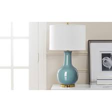 Price match guarantee enjoy free shipping and best selection of ceramic light blue table lamp that matches your unique tastes and budget. Safavieh Lighting Collection Paris Light Blue Ceramic 27 5 Inch Table Lamp Buy Online In Andorra At Andorra Desertcart Com Productid 15881826